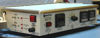 Exatron tape and reel tube feed with automatic hot sealling